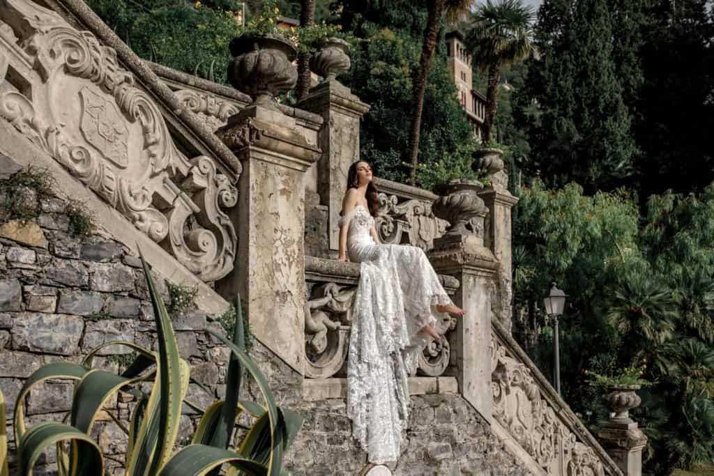 Model wears bridal gown and poses during editorial session