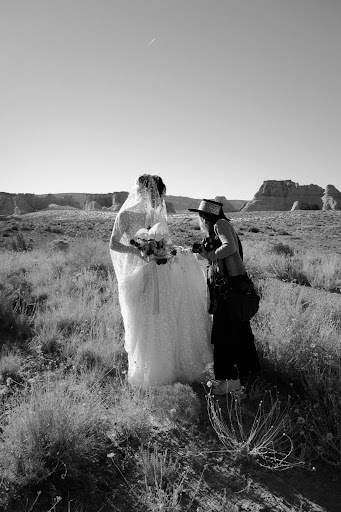 Behind the scenes of Lilly Red Photography, a photography mentor, as she photographs a destination wedding in Amangiri, Utah