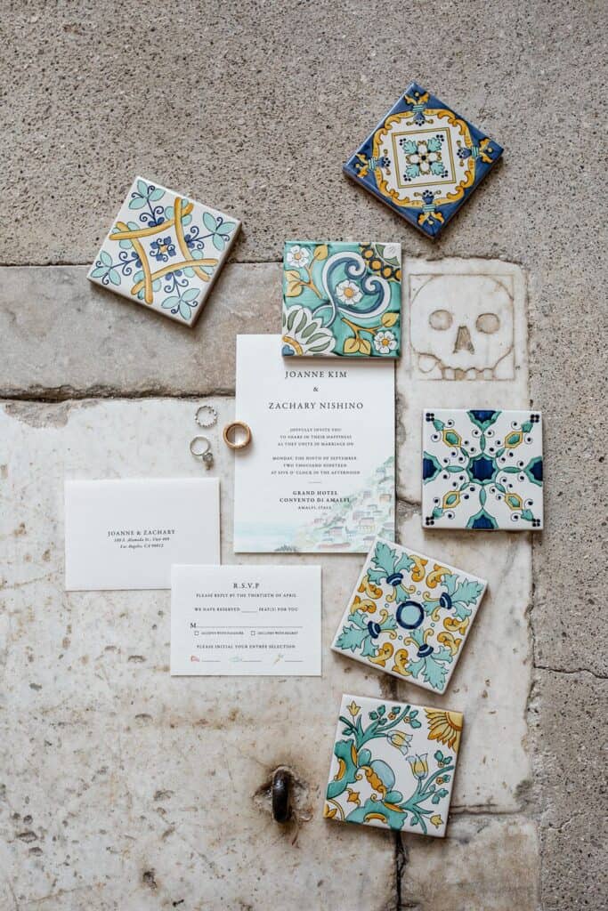 Creative flat lay wedding photography including bright, coastal-inspired tiles