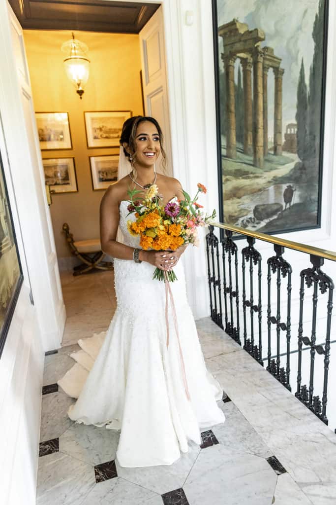 Bride begins walking to groom at Villa Astor for first look