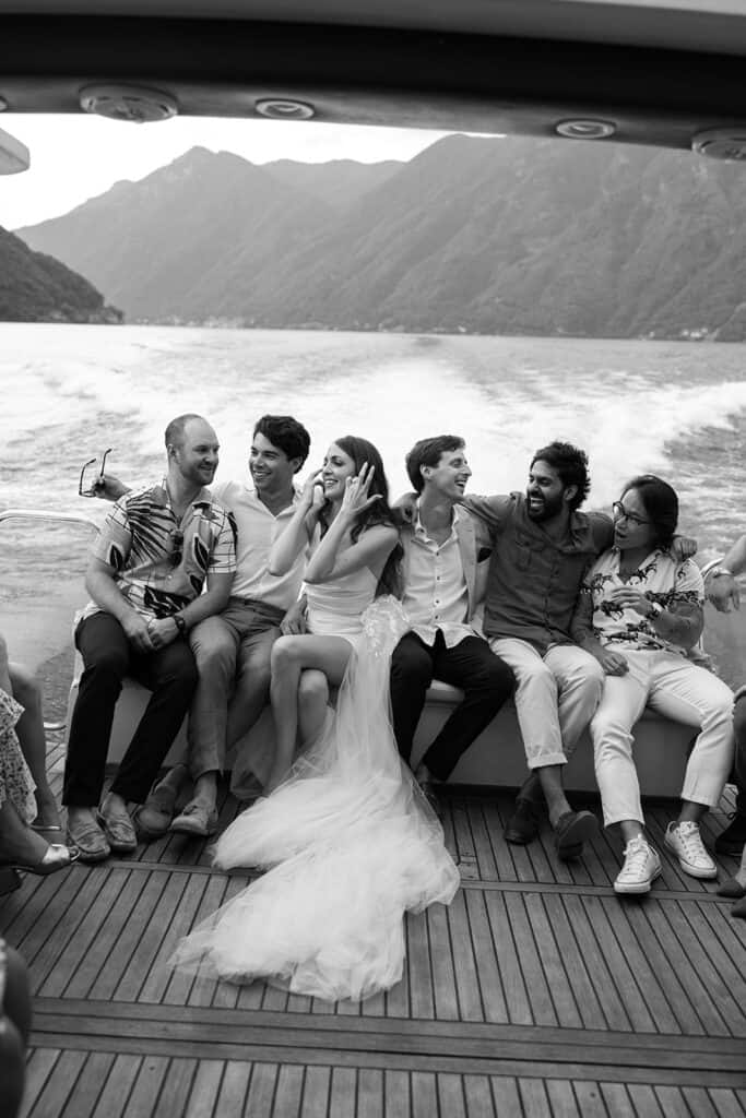 High end wedding clients take a boat ride across Lake Como