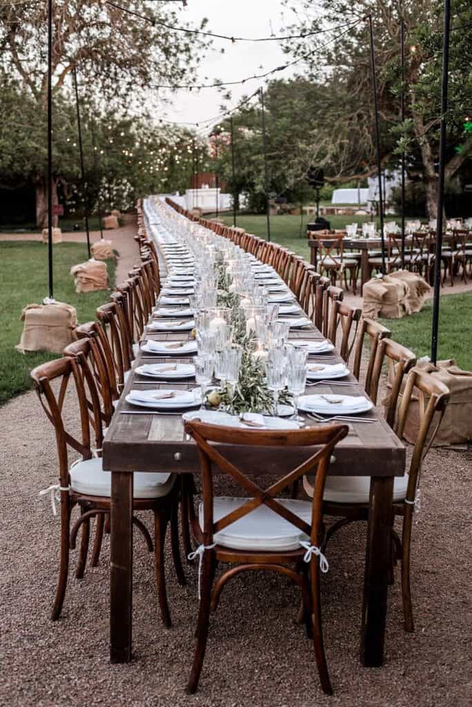 Enormous reception banquet table for luxury wedding clients in Ibiza, Spain