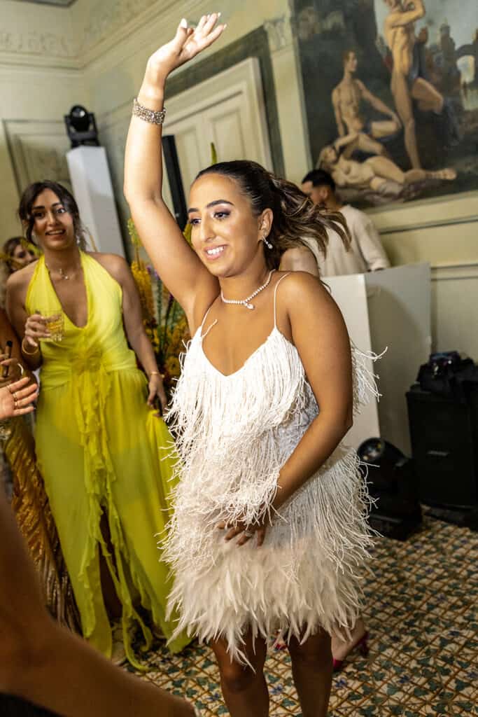 Bride dances at luxury wedding reception in Italy