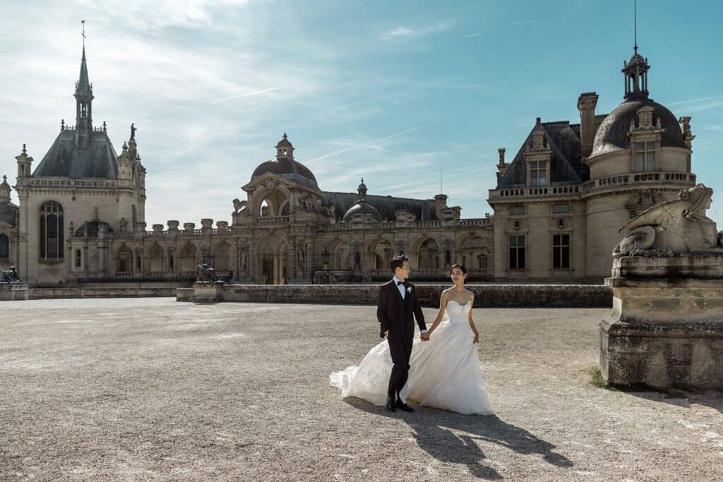 Bride and groom epic Chateau de Chantilly portrait