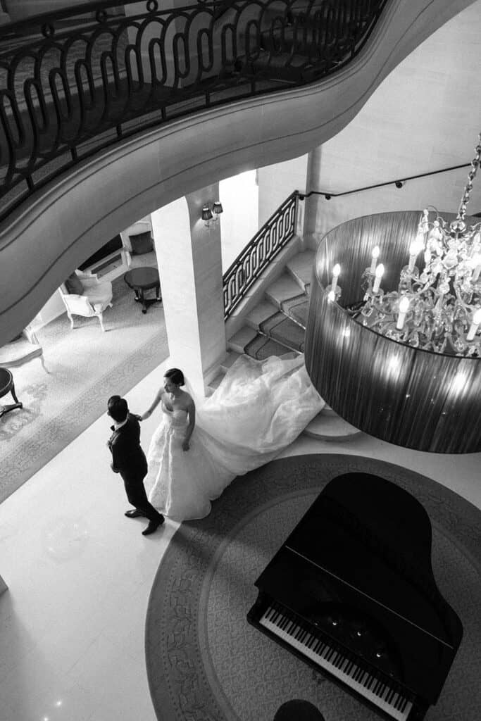 Black and white portrait of bride and groom first look at French destination wedding