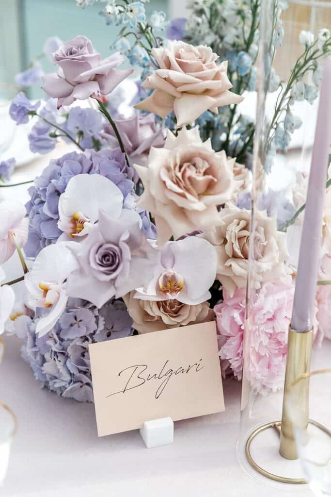 Pastel color wedding reception flower arrangement